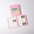 Étui rose Mew fermé et ouvert avec seize emplacements pour cartouches Nintendo Switch